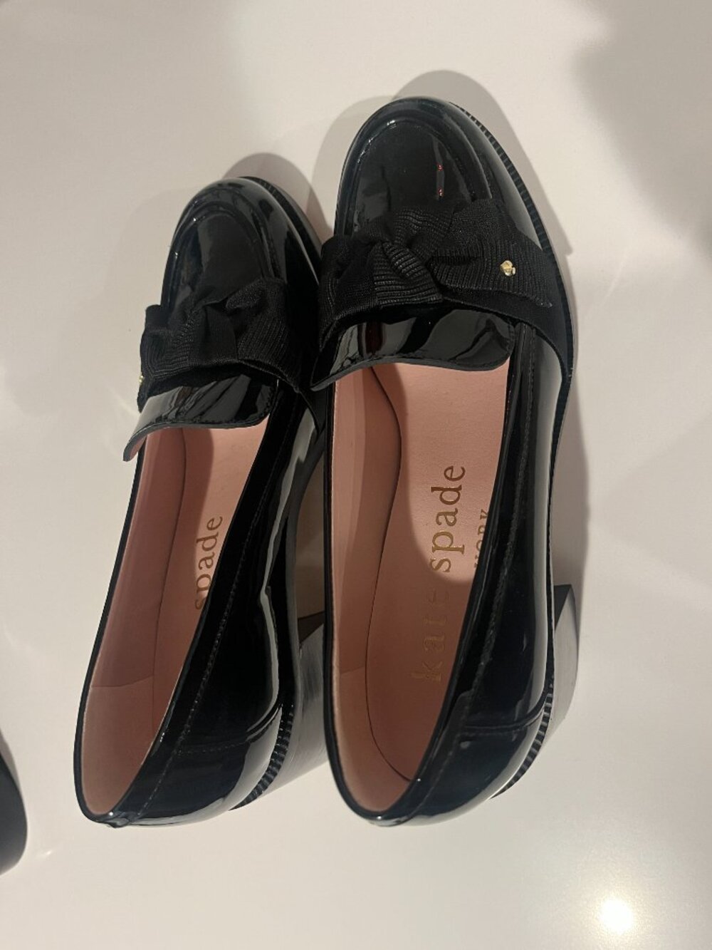 Kate Spade New York patent leather bow loafers in size 9B.